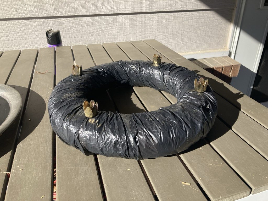 Wreath base with candle holders